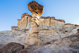 sunlight-kissed-hoodoo-towering-sandstone-hill.jpg